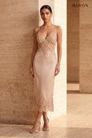 Champagne Lace V-Neck Slip Dress – worn by model, travertine setting