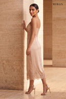 Champagne Lace V-Neck Slip Dress – worn by model, travertine setting
