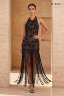 Black Lace Halter Tassel Dress – worn by model, travertine setting