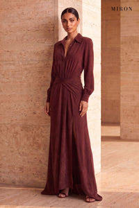 Burgundy Cupro Shirt Dress – worn by model, travertine setting