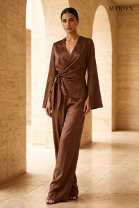 Chocolate Satin Wrap Top & Trouser Set – worn by model, travertine setting