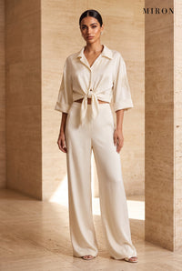 Cream Satin Set with Embroidered Sleeves – worn by model, travertine setting