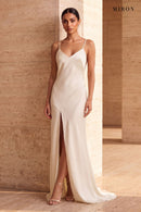Cream Satin Slip Maxi Dress – worn by model, travertine setting