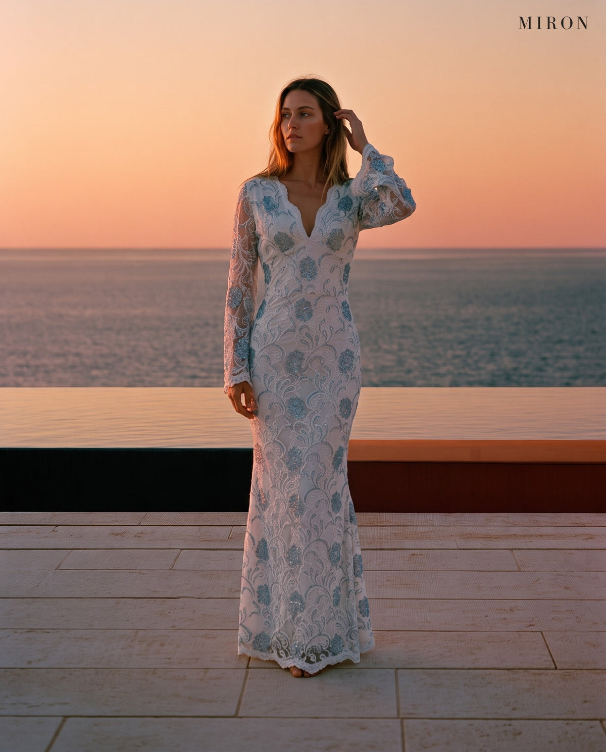 Miron White Long Dress ED-WHT-083 - pool terrace at dusk