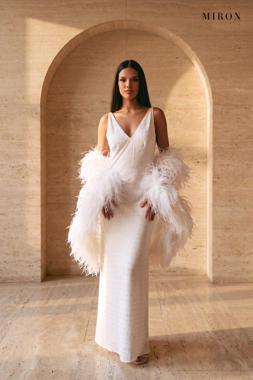 White Crystal Slip Gown & Feather Cape – worn by model, travertine setting